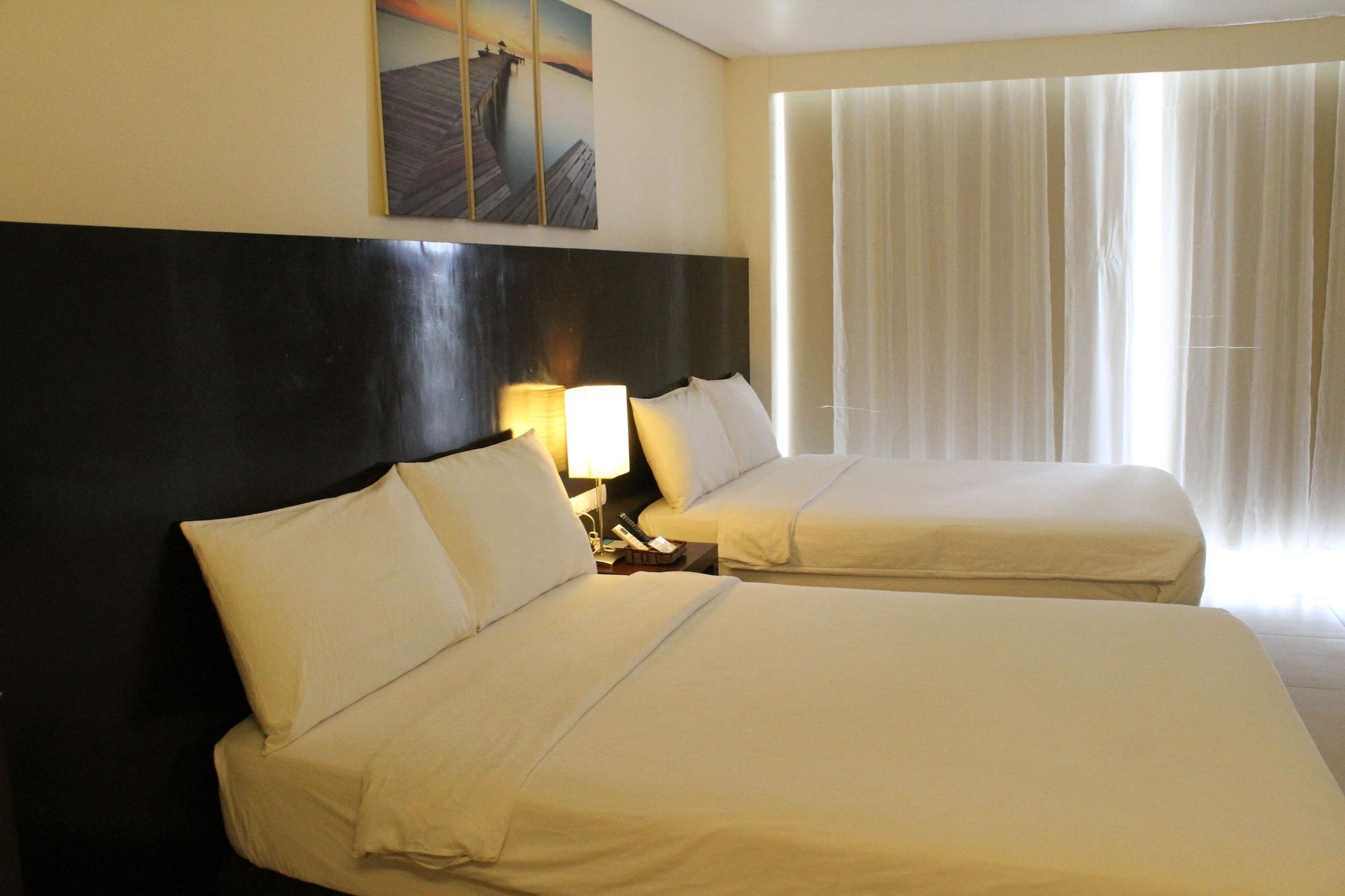 Ocean Suites Bohol Boutique Hotel ตักบีลารัน ซิตี ภายนอก รูปภาพ